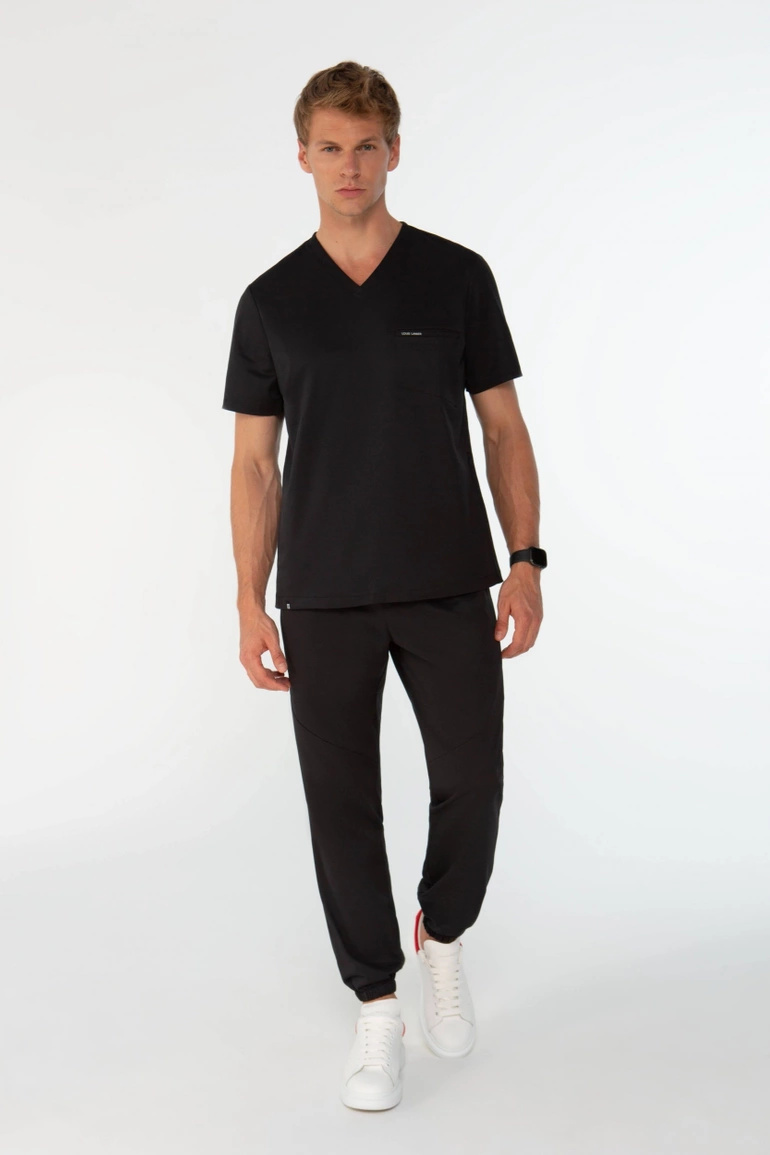 SAUMUR - jogger scrub pants - Pure black